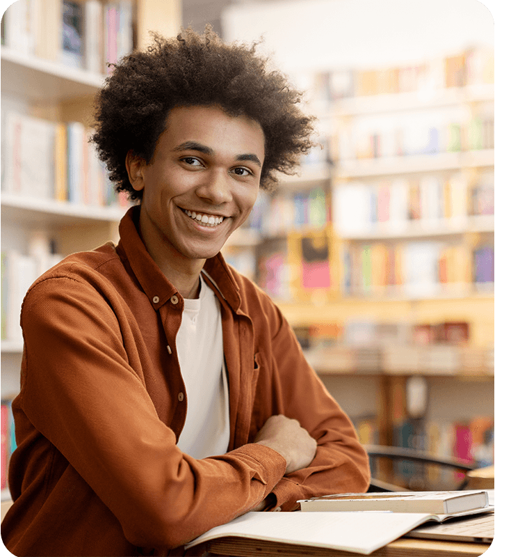 Smiling young professional at a desk